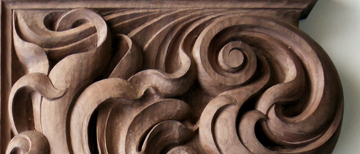Detail of Art Nouveau-style bracket hand-carved by Agrell Architectural Carving.