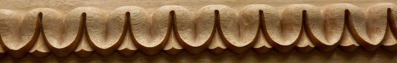 Wood-carved lamb's tongue moulding by Agrell Architectural Carving.