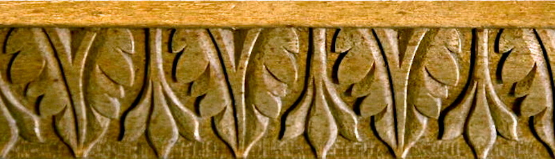Wood-carved acanthus and bellflower moulding by Agrell Architectural Carving.