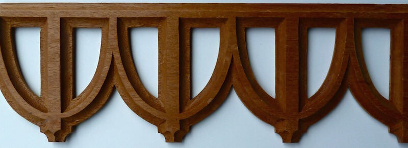Wood-carved pierced Gothic tracery by Agrell Architectural Carving.