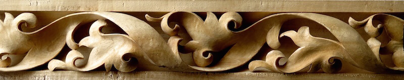 Wood-carved Gothic-style spiraling leaf moulding by Agrell Architectural Carving.