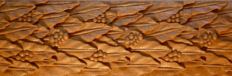 Wood-carved laurel leaf moulding by Agrell Architectural Carving.