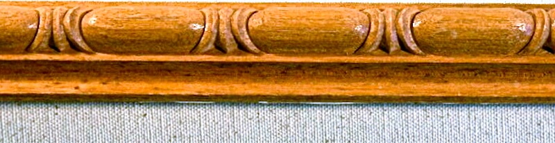 Wood-carved cabochon and dart moulding by Agrell Architectural Carving.