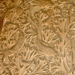Art Nouveau panel with fish and seaweed, based on a design by M.P. Verneuil and hand-carved by Agrell Architectural Carving.