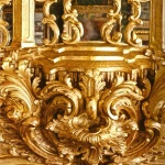 Detail of a Rococo fire surround, hand-carved and gilded by Agrell Architectural Carving