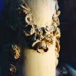 Oak newel post with hand-carved roses