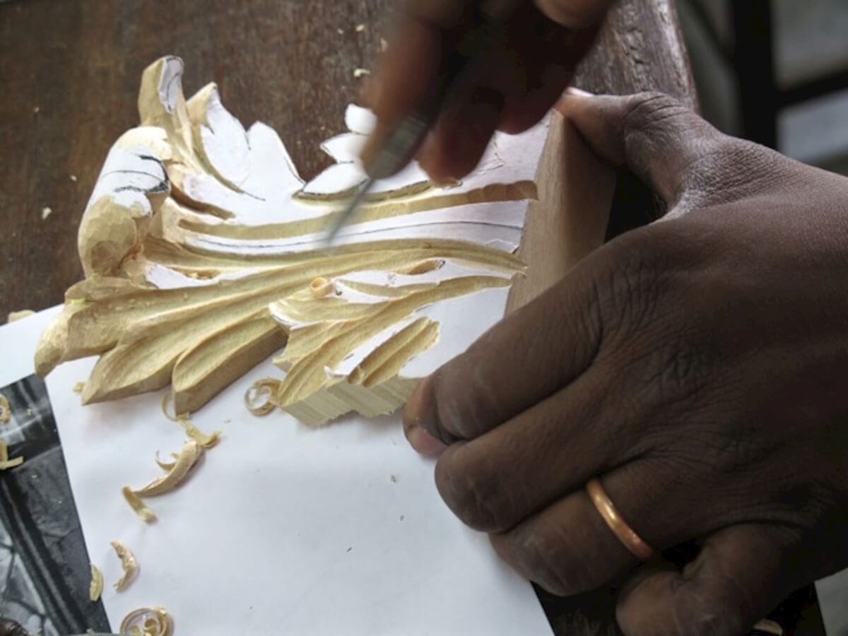Acanthus flourish being hand-carved
