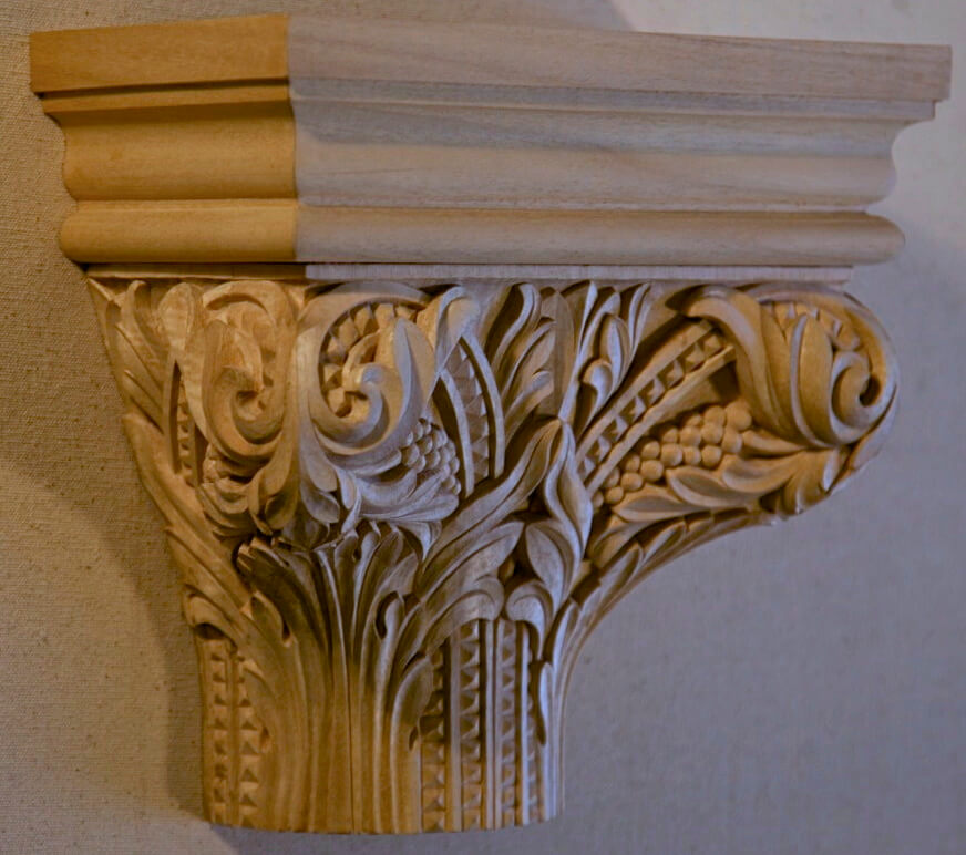 Carved wood capital in the Romanesque style